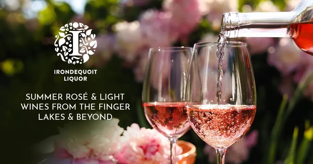 Rosé wine poured into glasses with flowers in background; Irondequoit Liquor summer promotion.